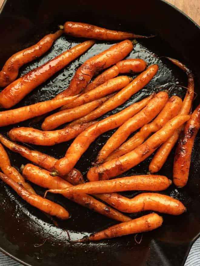roasted carrots in a cast iron skillet
