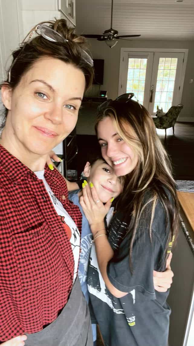 mother, daughter, & son in a selfie