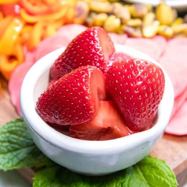 Pickled strawberries in a serving bowl.