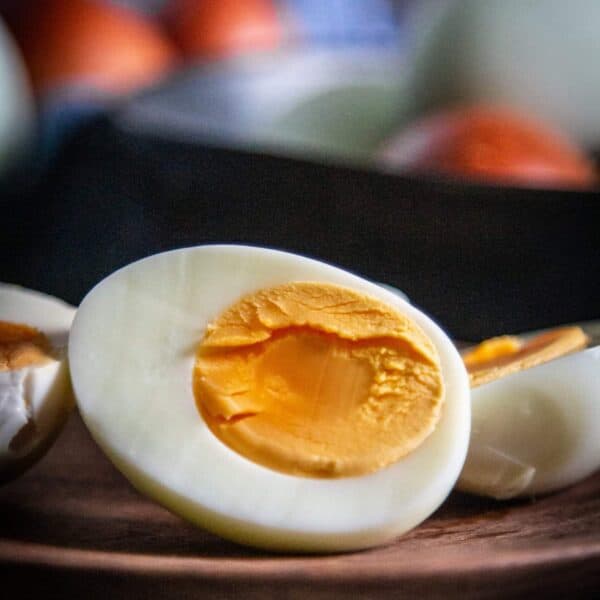 cut open hard boiled egg on plate