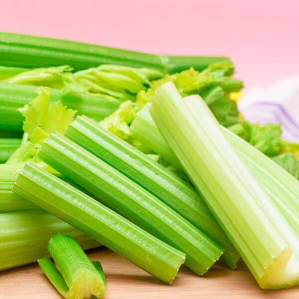 chopped celery sticks on cutting board